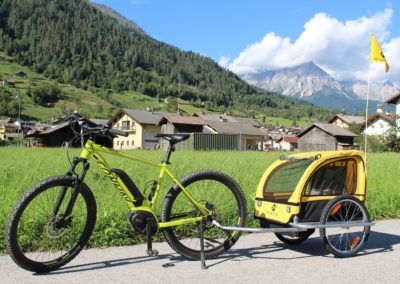 noleggio bici con carrellino porta bambini Cicli Bettega Primiero